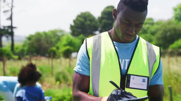 Volunteers collecting rubbish and recycling