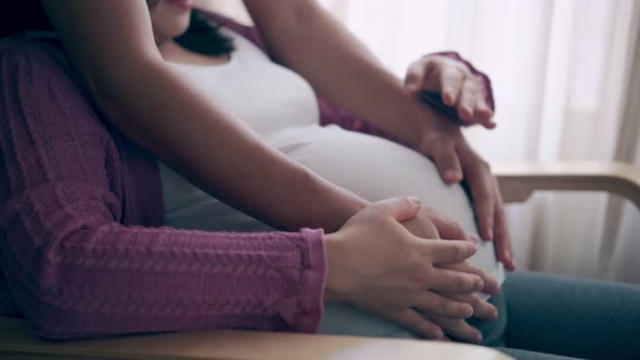 Pregnant Couple Feels Love and Relax at Home