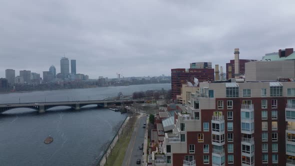 Forwards Fly Around Modern Apartment Buildings on Waterfront