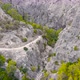 Flying Among Rocky Mountains in a Deep Prehistoric Gorge - VideoHive Item for Sale