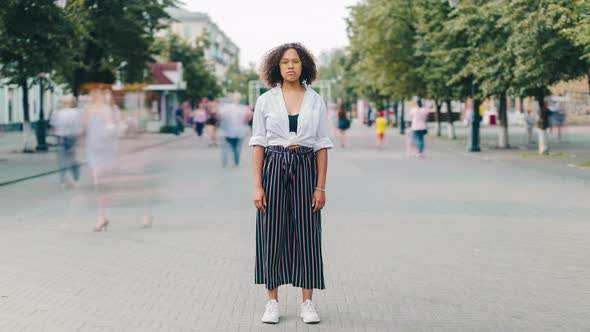 Time Lapse of Attractive African American Girl Outdoors on Pedestrian Street