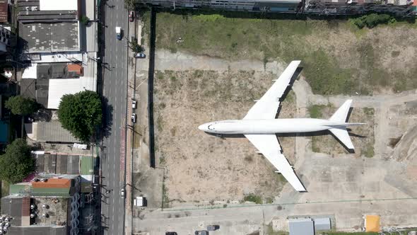 Topdown view old Jumbo Jet abandoned in the city, Pattaya Downtown, Thailand