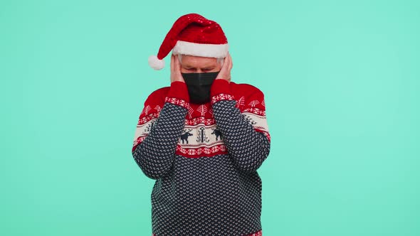 Senior Christmas Grandfather Wearing Face Mask Ppe to Safe From Coronavirus on Lockdown Quarantine