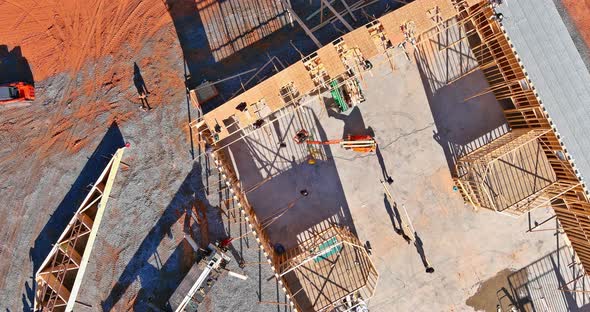 Roofer Working with Framing Installing the Roof Truss System