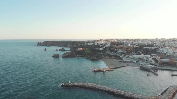 Fort Ponta da Bandeira protecting the Bensafrim River's quay. Panoramic aerial of Lagos, Algarve