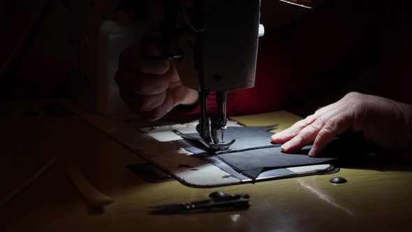 Sewing Machine and Men's Hands of a Tailor