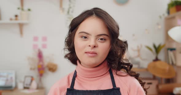 Close Up View of Charming Teen Girl with Special Needs Looking To Camera, Portrait of Adorable Sunny