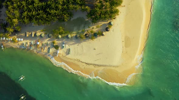 Aerial View of Paradise White Sand Beach and Azure Sea on Tropical Daku Island in Siargao