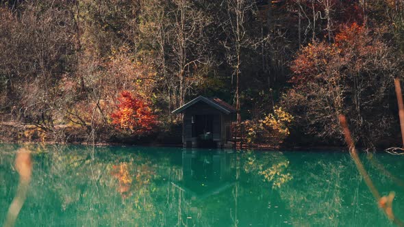 Drone Of Klammsee Reservoir In Autumn With Boathouse