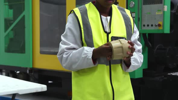 Warehouse female worker working in factory