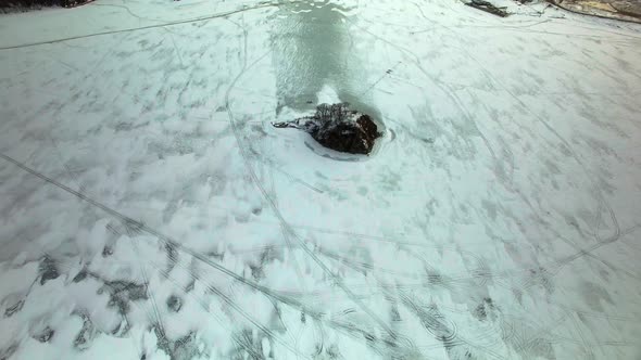 Drone View Frozen Sea Overlooking Small Island Middle