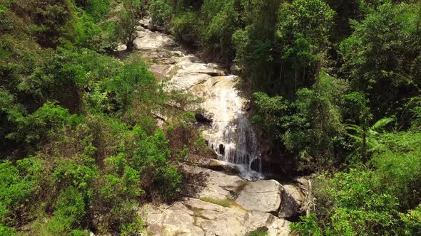 Drone Flight Over a Waterfall in the Tropical Rainforest Jungle on Summer Day
