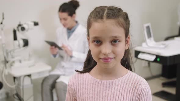 Portrait Of Little Girl At Oculist Office