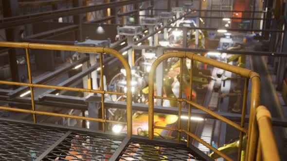Interior of Car Factory with a Production Line alt