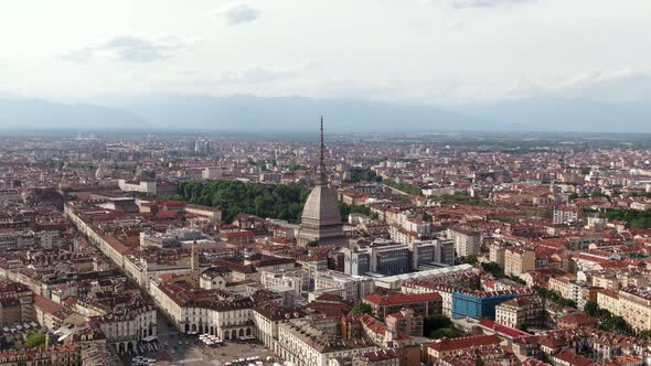 Mole Antonelliana building and cityscape of Turin, aerial dolly zoom effect