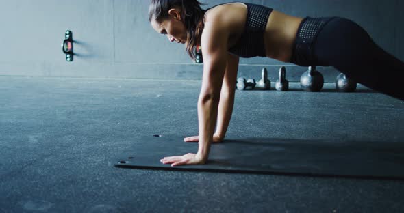 Woman Exercising in the Gym