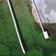 Top down view of snow covered docks in a partly frozen lake. - VideoHive Item for Sale