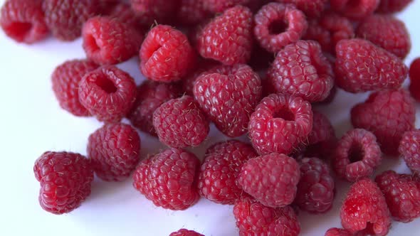 Close-up Rotation. Red Raspberry Spinning on the Table