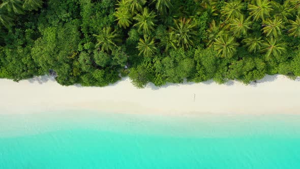 Luxury birds eye clean view of a sunshine white sandy paradise beach and blue ocean background in hi