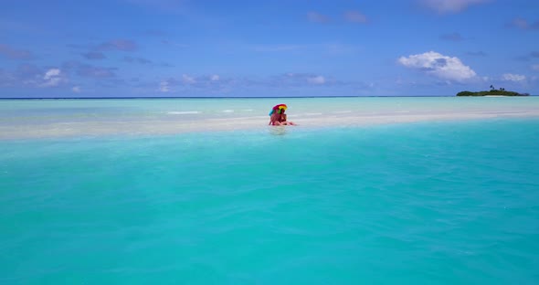 Young boy and girl married on vacation have fun on beach on paradise white sand background 4K