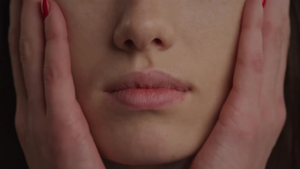 Close Up of a Mouth and Woman Hands in a Wow or Shock Emotion Expression Gesture