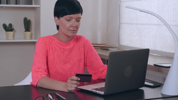 Businesswoman Using Internet for Shopping