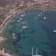 aerial view of a beautiful beach and boats. swimming people aerial. - VideoHive Item for Sale