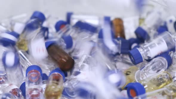 Falling Down HPLC Glass Vials with Blue Caps After Analysis