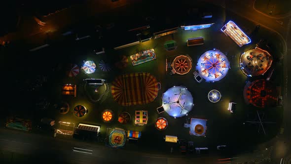 Aerial Time Lapse of a Fun Fair at Night