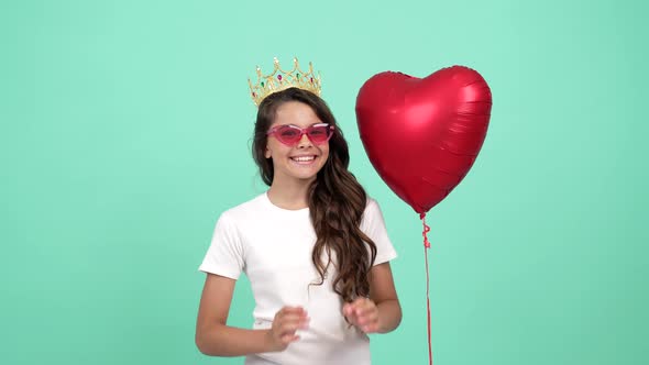 Happy Laughing Kid in Sunglasses and Crown with Heart Balloon Felt Sad After It Flew Disappointment