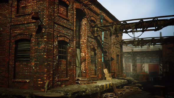 Abandoned Industrial Factory Buildings at Sunset