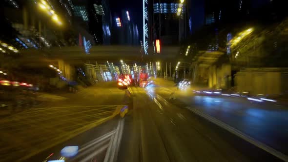 Futuristic Cityscape, City Life Pov Night Driving Hyperlapse Through Hong Kong Business District.