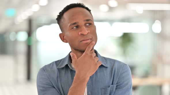 Portrait of Thoughtful Casual African Man Thinking