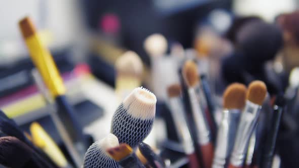 Set of Brushes for Makeup on Table in Dressing Room