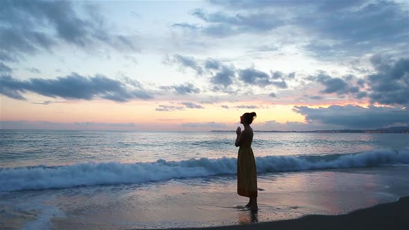 Woman Laying on the Beach Enjoying Summer Holidays Looking at the Sea