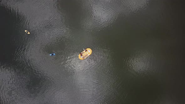 Overhead view of a yellow rafting boat on the Nile River in Jinja, Uganda.