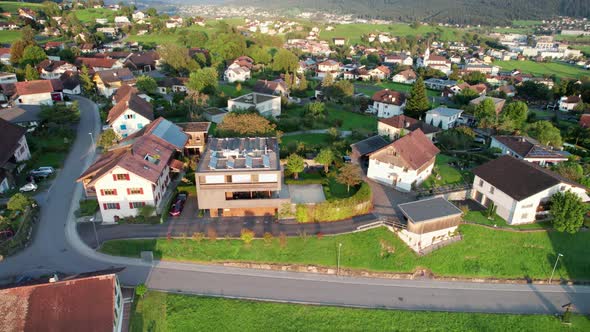 Aerial View of Liechtenstein with Houses on Green Fields in Alps Mountain Valley