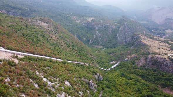 White Pipes Stretching Almost to the Top of the Mountain