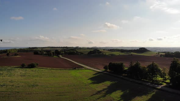 Aerial view of fields with brown mold close to Sejerøbugten in Odsherred.