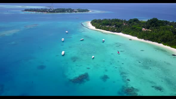 Aerial panorama of paradise seashore beach time by blue ocean and bright sandy background of adventu