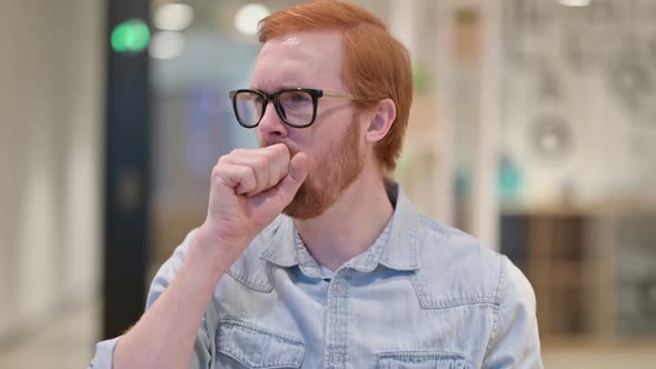 Sick Young Redhead Man Coughing