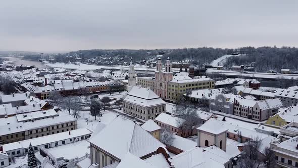 Descending aerial shot of Kaunas Old Town during winter season
