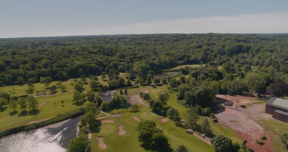Aerial Pan Around of a Golf Course and Beach Shores in Glen Cove Long Island
