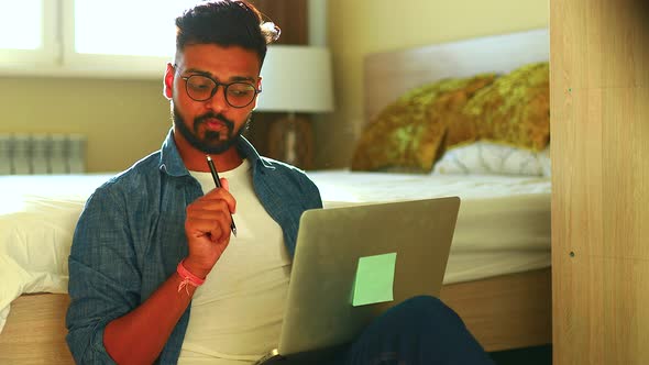 Indian Businessman Talking to Camera Making Conference Business Call