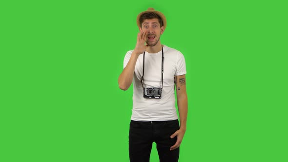 Confident Guy Is Screaming Calling Someone. Green Screen