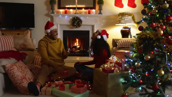 Couple at home at Christmas time