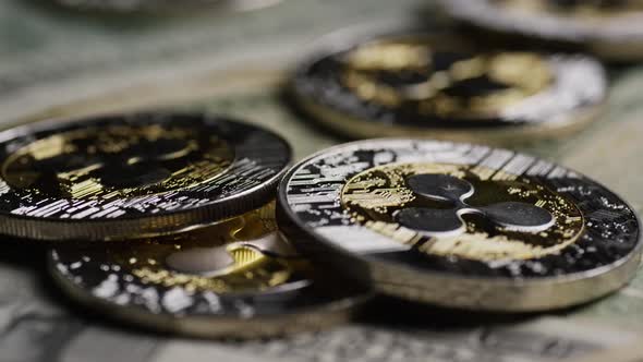 Rotating shot of Bitcoins (digital cryptocurrency) - BITCOIN RIPPLE 