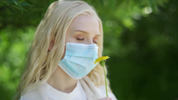 A Young Woman Cannot Smell Flowers Without a Mask Due to Her Allergy to the Bloom