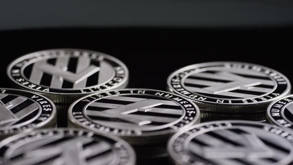 Rotating shot of Bitcoins (digital cryptocurrency) - BITCOIN LITECOIN 