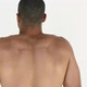 Man stretching shoulders and back, rear view - VideoHive Item for Sale